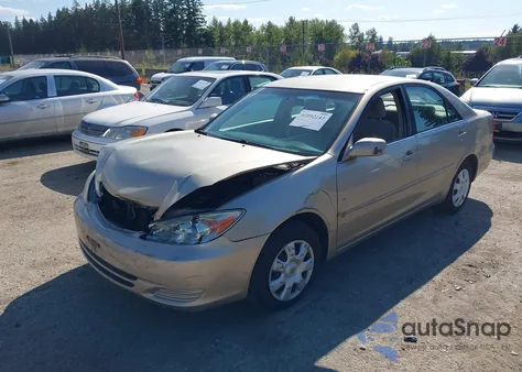 2002 Toyota Camry Le z USA, uszkodzony, nr VIN 4T1BE32K82U534669